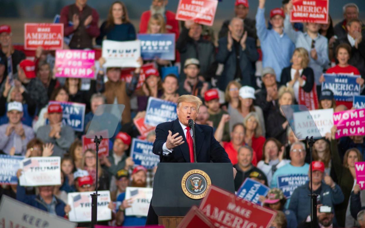 President Donald Trump speaks at a campaign rally at Minuteman Aviation Hangar in Missoula, Mont., Thursday Oct. 18, 2018. - FR128134 AP