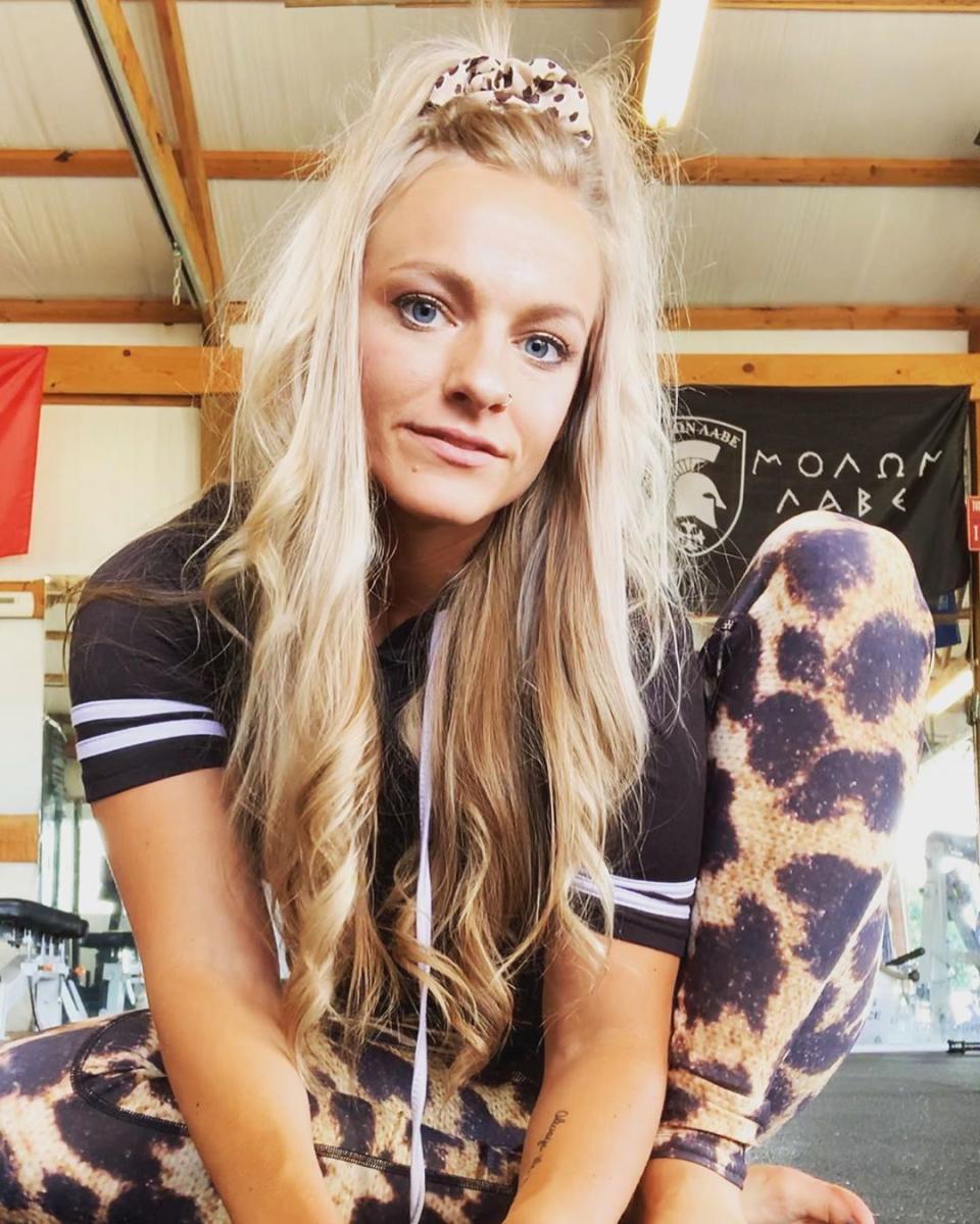 Mackenzie McKee poses in leopard-print leggings