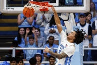 North Carolina's Elliot Cadeau dunks during the second half of an NCAA college basketball exhibition game against Saint Augustine's in Chapel Hill, N.C., Friday, Oct. 27, 2023. (AP Photo/Ben McKeown)