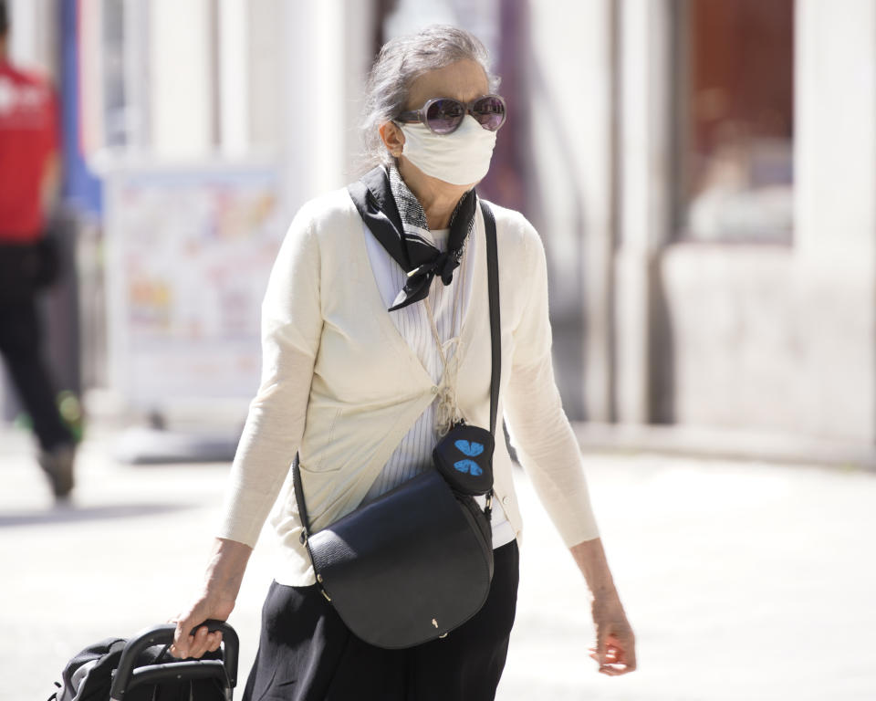 An elderly woman is seen wearing a face mask on July 1, 2020 in Warsaw, Poland. Poland has still not managed to decrease it's daily numbers of new COVID-19 cases and has nearly 35 thousand known cases as of June 29, 2020. (Photo by Jaap Arriens/NurPhoto via Getty Images)
