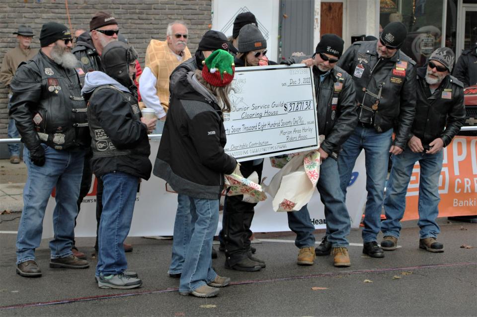 The Marion Area Harley Riders Association raised $37,871. 38 for the Junior Service Guild's Christmas Clearinghouse project. The group presented its check to Jodi Rife of the Junior Service Guild on Saturday, Dec. 3, 2022, during the annual WMRN Peanut Push.