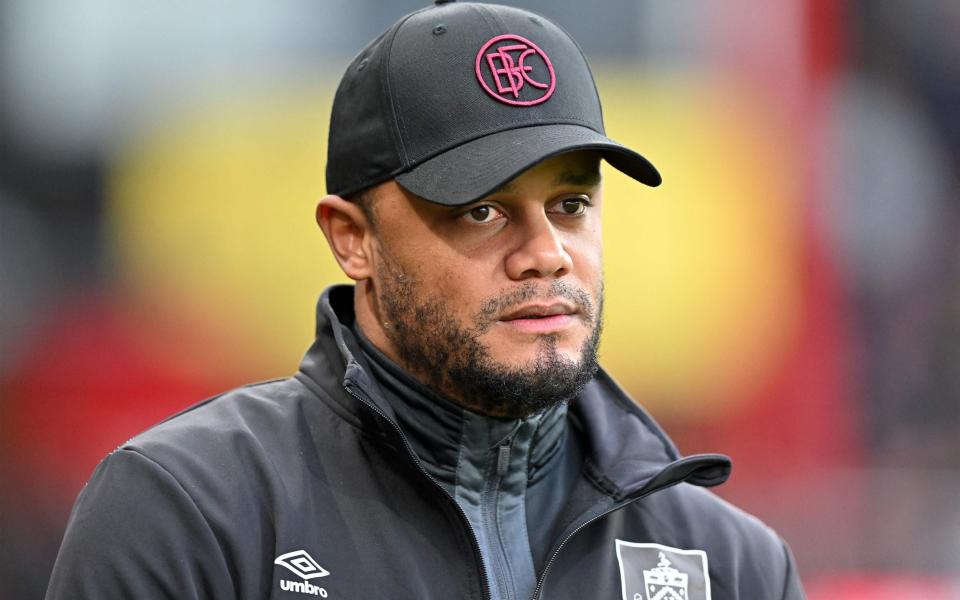 Burnley manager Vincent Kompany looks on as he makes his return to Manchester City this evening - Glyn Kirk/AFP