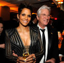 Halle Berry and Richard Gere attend the 2013 Vanity Fair Oscar Party hosted by Graydon Carter at Sunset Tower on February 24, 2013 in West Hollywood, California.
