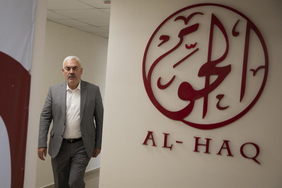 Shawan Jabarin, director of the al-Haq human rights group, at the organization's offices in the West Bank city of Ramallah, Saturday, Oct. 23, 2021. Israel on Friday, Oct. 22, declared six prominent Palestinian human rights groups to be terrorist organizations, saying they were secretly linked to a left-wing militant movement. It was not immediately clear what the distinction would mean for the groups, most of which also protest rights violations by the Western-backed Palestinian Authority. (AP Photo/Majdi Mohammed)