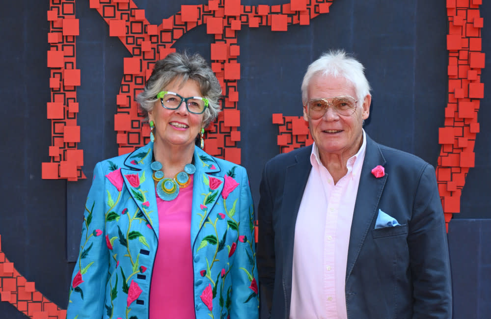 Dame Prue Leith and John Playfair ride a three-wheeled Harley-Davidson credit:Bang Showbiz