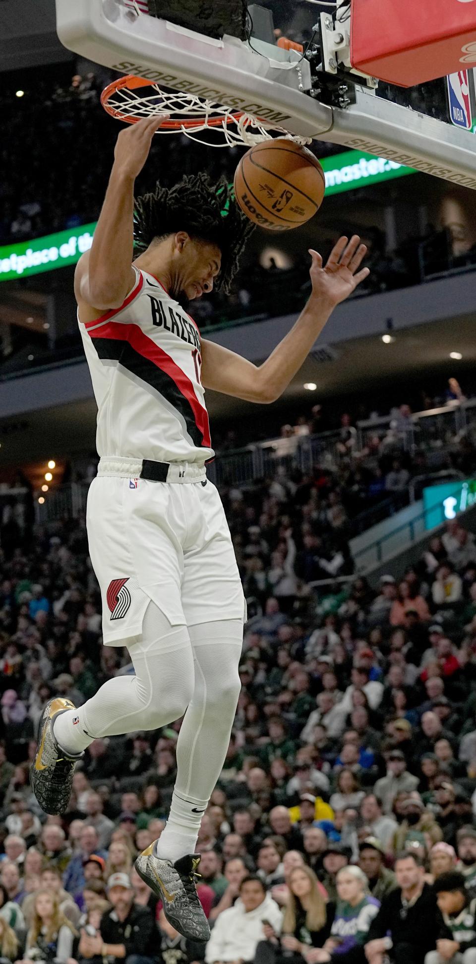 Portland Trail Blazers guard Shaedon Sharpe (17) dunks during the first half of their game against the Milwaukee Bucks Sunday, November 26, 2023 at Fiserv Forum in Milwaukee, Wisconsin.