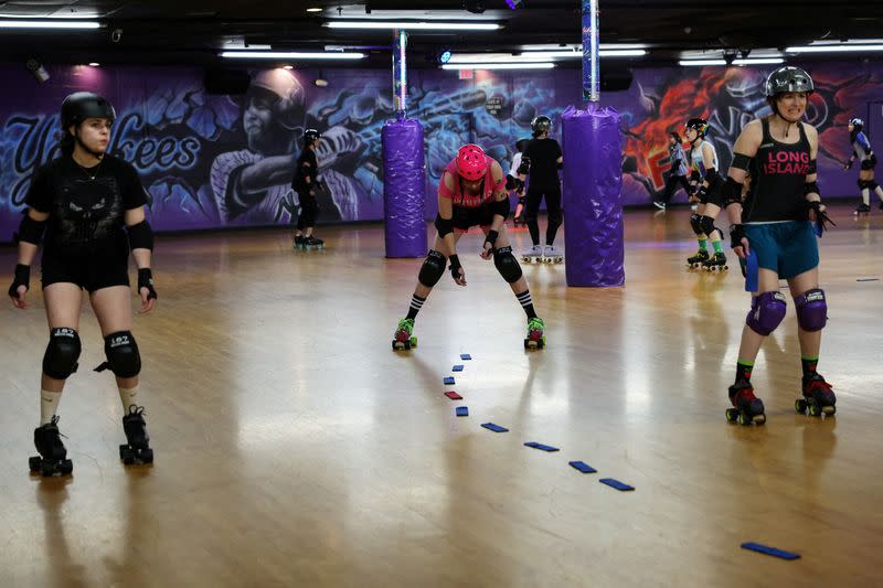 FILE PHOTO: New York's Long Island Roller Rebels practice at the United Skates of America Roller Skating facility in Massapequa, New York