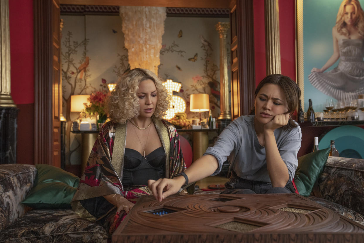 Glass Onion: A Knives Out Mystery (2022). (L-R) Kate Hudson as Birdie and Jessica Henwick as Peg. Cr. John Wilson/Netflix Â© 2022.