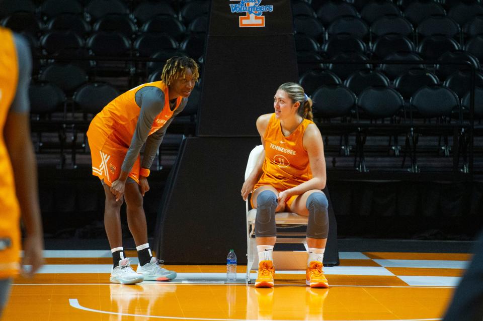 Tennessee forward Karoline Striplin (11) and guard Talaysia Cooper (55) talk to each other during Lady VolsÕ media day at Thompson-Boling Arena at Food City Center on Monday, Oct. 23, 2023.