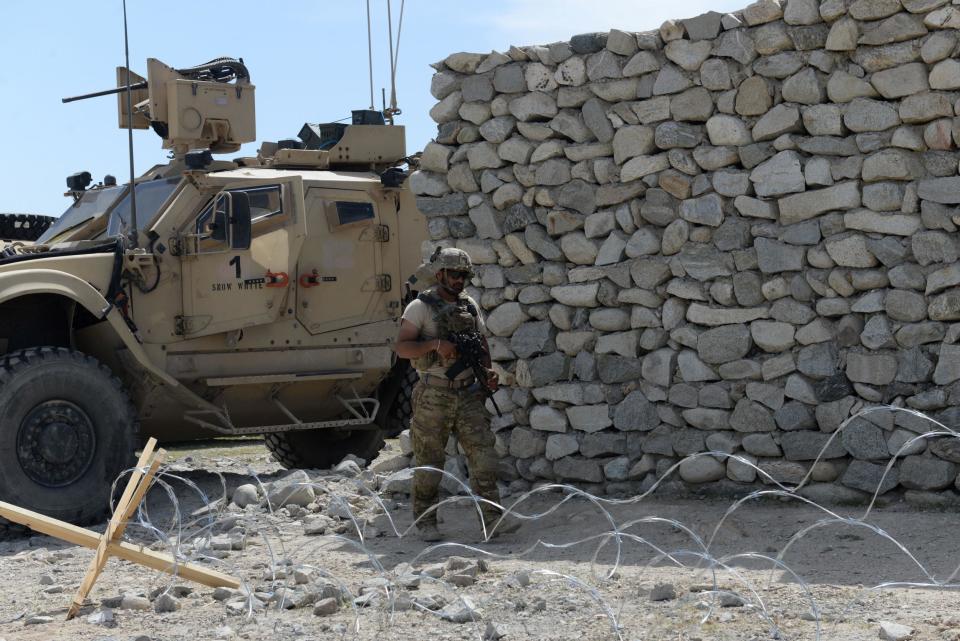 A US soldier patrols the area near the site where the MOAB was dropped in the Achin district of Nangarhar province in Afghanistan: NOORULLAH SHIRZADA/AFP/Getty Images