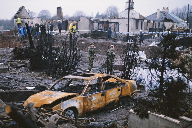 Some of the destruction caused by Pan Am Flight 103 after it crashed onto the town of Lockerbie in Scotland, on December 21,1988.