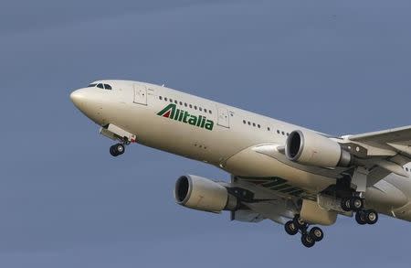 An Alitalia airplane takes off at the Fiumicino International airport in Rome, Italy February 12, 2016. REUTERS/Tony Gentile