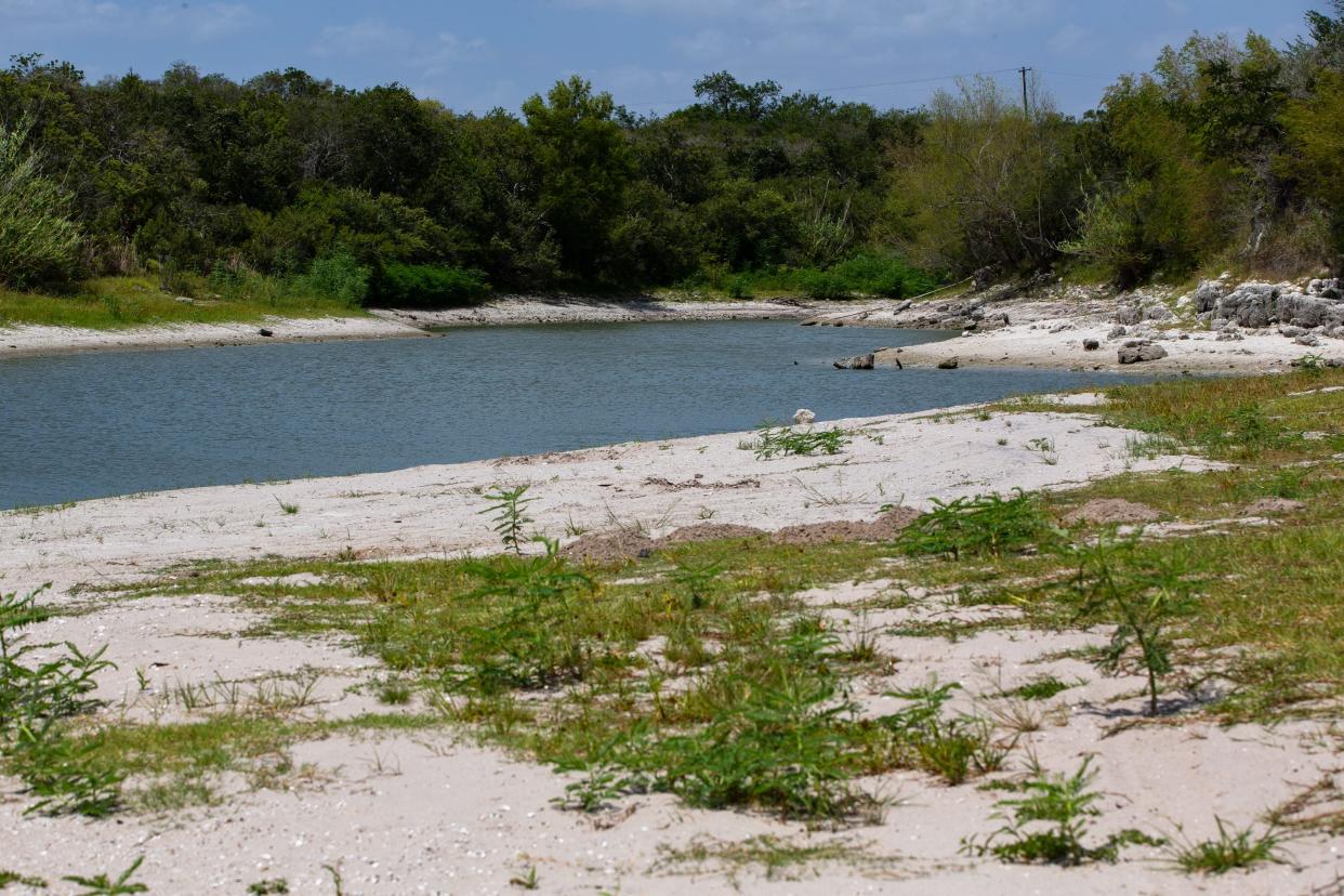 In this archive photo, low water levels expose extra shoreline at Lake Corpus Christi on Aug. 3, 2022, as the region experienced a prolonged Stage 1 drought that continues today.