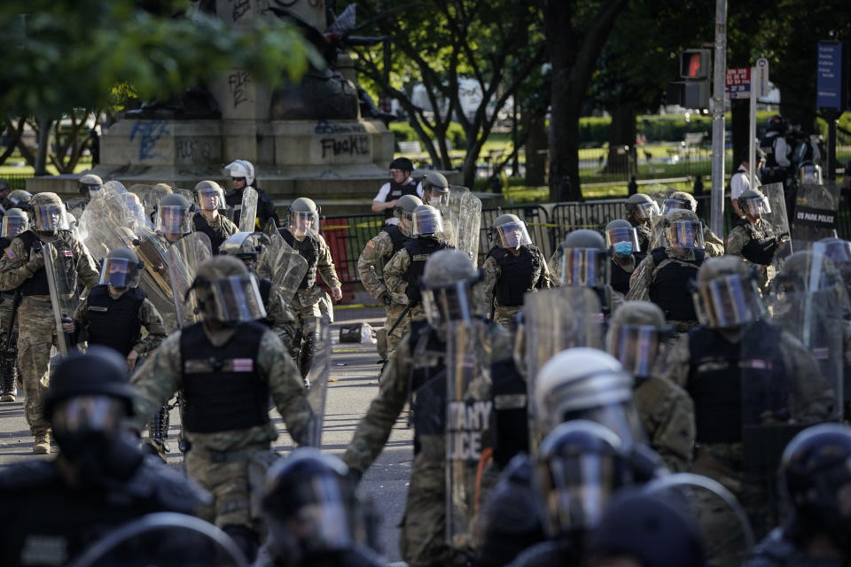 Law enforcement officers mobilizes to clear the path of protesters for Donald Trump's photo-op with a Bible on June 1. (Photo: Drew Angerer via Getty Images)