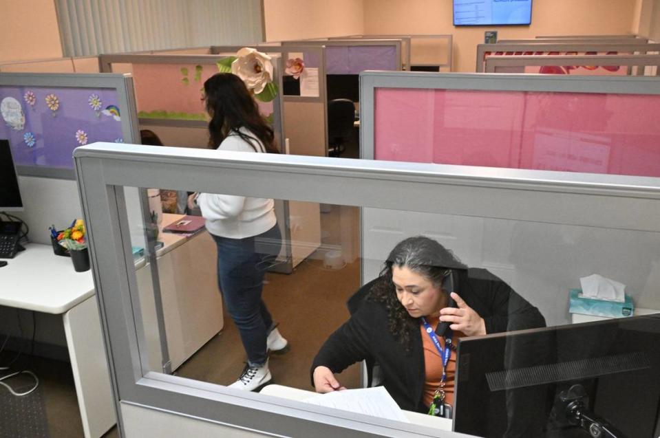 Suicide Prevention Specialist Luz Lopez, bottom right, answers a call at the 988 Suicide & Crises Lifeline call center Friday, April 26, 2024 in Fresno.