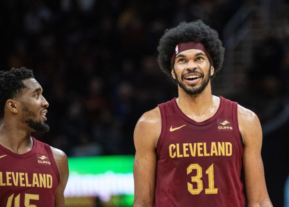 Cleveland Cavaliers' Jarrett Allen (31) and Donovan Mitchell, left, smile after a game Jan. 7 against the San Antonio Spurs in Cleveland.