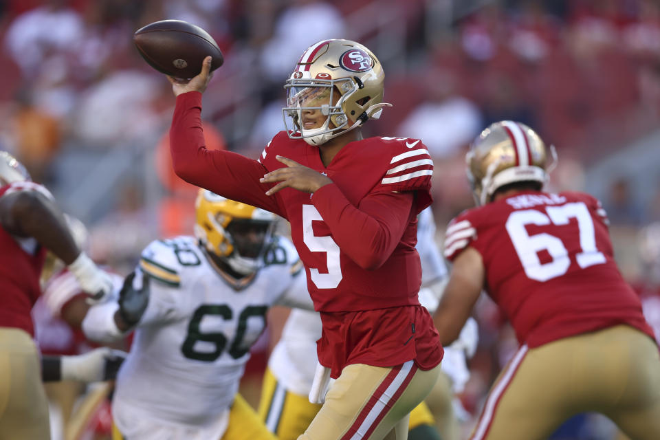 San Francisco 49ers quarterback Trey Lance (5) passes against the Green Bay Packers during the first half of an NFL preseason football game in Santa Clara, Calif., Friday, Aug. 12, 2022. (AP Photo/Jed Jacobsohn)