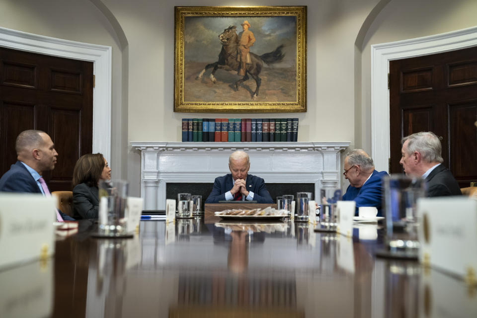 FILE - President Joe Biden speaks during a meeting with Democratic lawmakers in the Roosevelt Room of the White House, Tuesday, Jan. 24, 2023, in Washington including from left, House Minority Leader Hakeem Jeffries of N.Y., Vice President Kamala Harris, Senate Majority Leader Sen. Chuck Schumer of N.Y., and Senate Majority Whip Dick Durbin of Ill.(AP Photo/Evan Vucci, File)