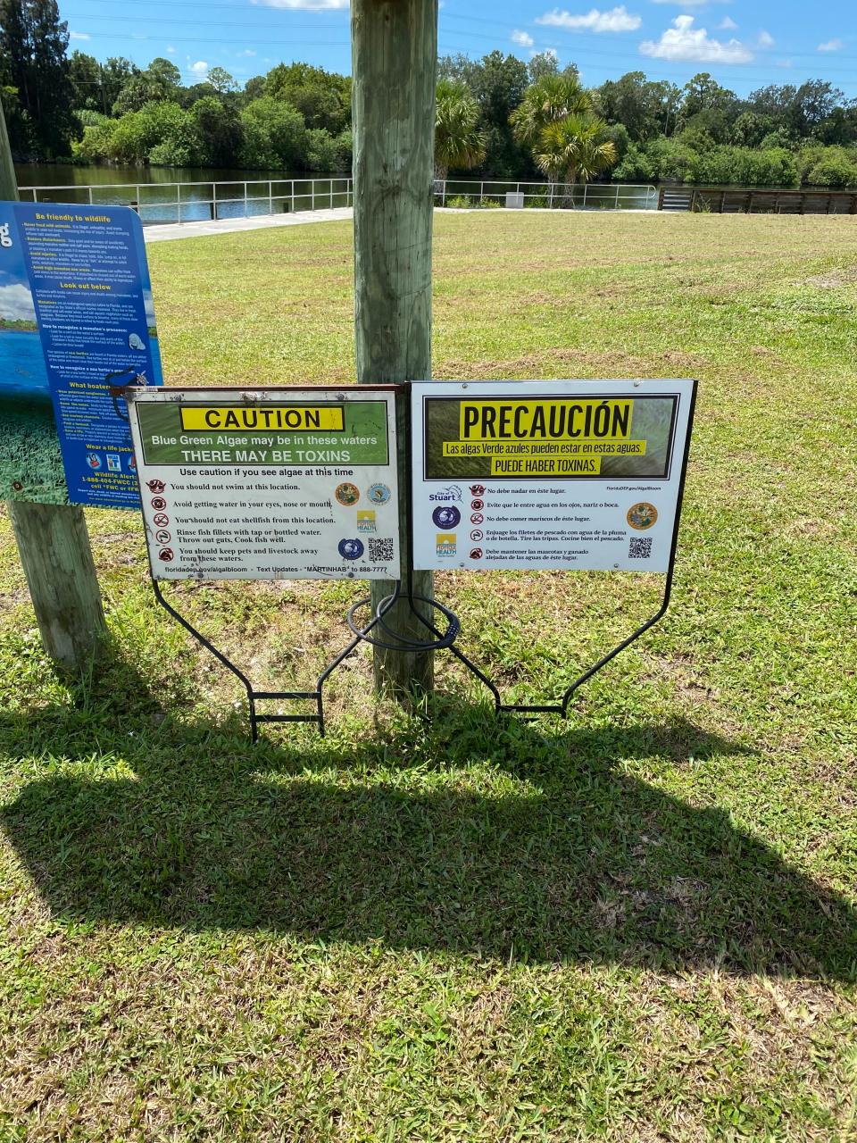 The Florida Department of Health office in Martin County put up toxic algae warning signs in English and Spanish at Timer Powers Park in Indiantown on Monday, Aug. 7, 2023.