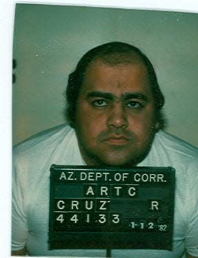 Robert Charles Cruz, a former Tempe businessman, won freedom in 2005 after more than 14 years behind bars as jurors returned verdicts acquitting him of murder and other charges in the 1980 contract killing of Phoenix print-shop owner William Redmond and his mother-in-law, Helen Phelps.