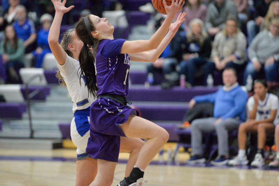 Albany's Tatum Findley goes up for a breakaway lay up against Foley at Albany High School on Friday, Jan. 28, 2022. 