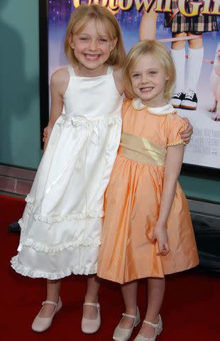 <p>Gregg DeGuire/WireImage</p> Dakota Fanning and Elle Fanning at the Archlight Theatre in Hollywood, California.