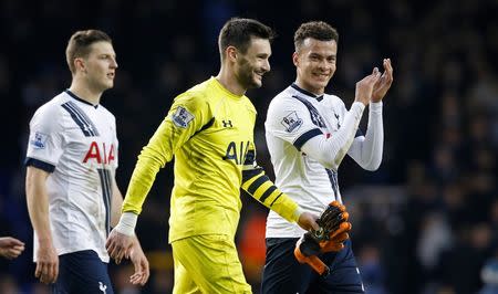 Football Soccer - Tottenham Hotspur v Watford - Barclays Premier League - White Hart Lane - 6/2/16 Tottenham Hotspur's Dele Alli (R), Hugo Lloris (C) and Kevin Wimmer celebrate winning after the game Action Images via Reuters / Andrew Couldridge Livepic