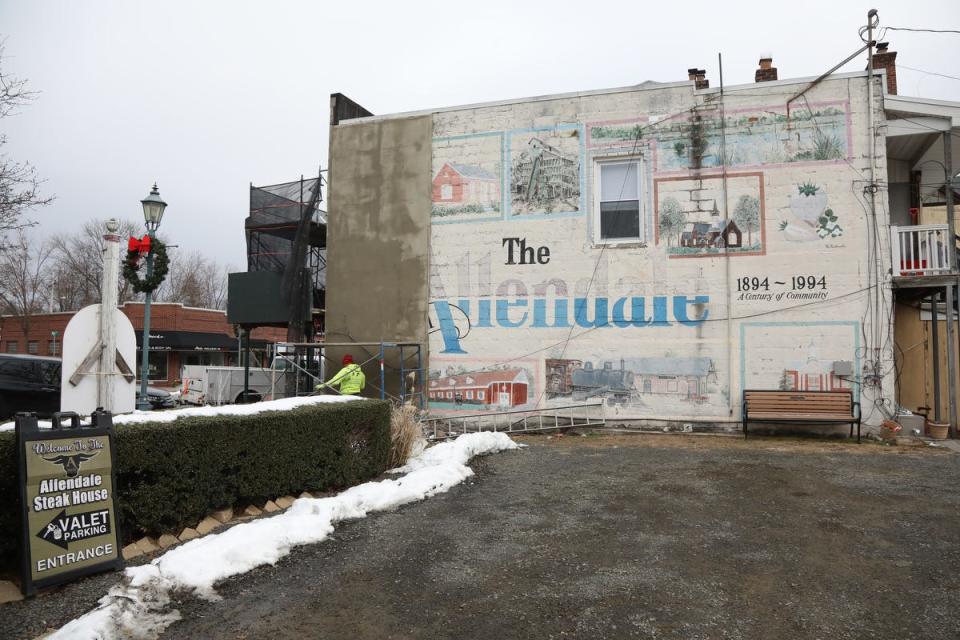 Allendale's centennial mural on West Allendale Avenue was plastered over in December 2019 to address brick wall structural issues.