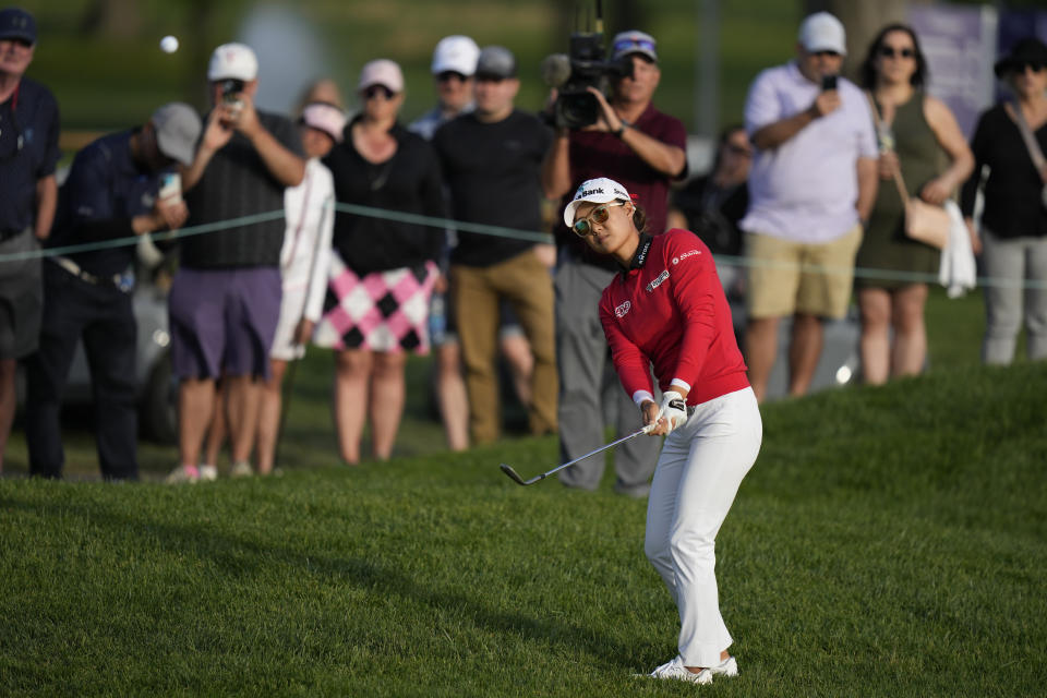 Minjee Lee, of Australia, hits from the rough on the 18th hole during the final round of the LPGA Cognizant Founders Cup golf tournament, Sunday, May 14, 2023, in Clifton, N.J. (AP Photo/Seth Wenig)