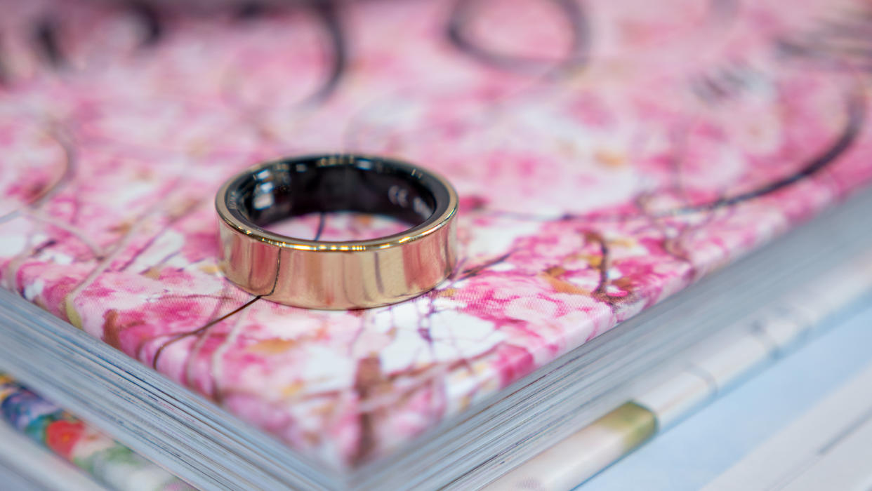  The Galaxy Ring on a book with a flowery design. 