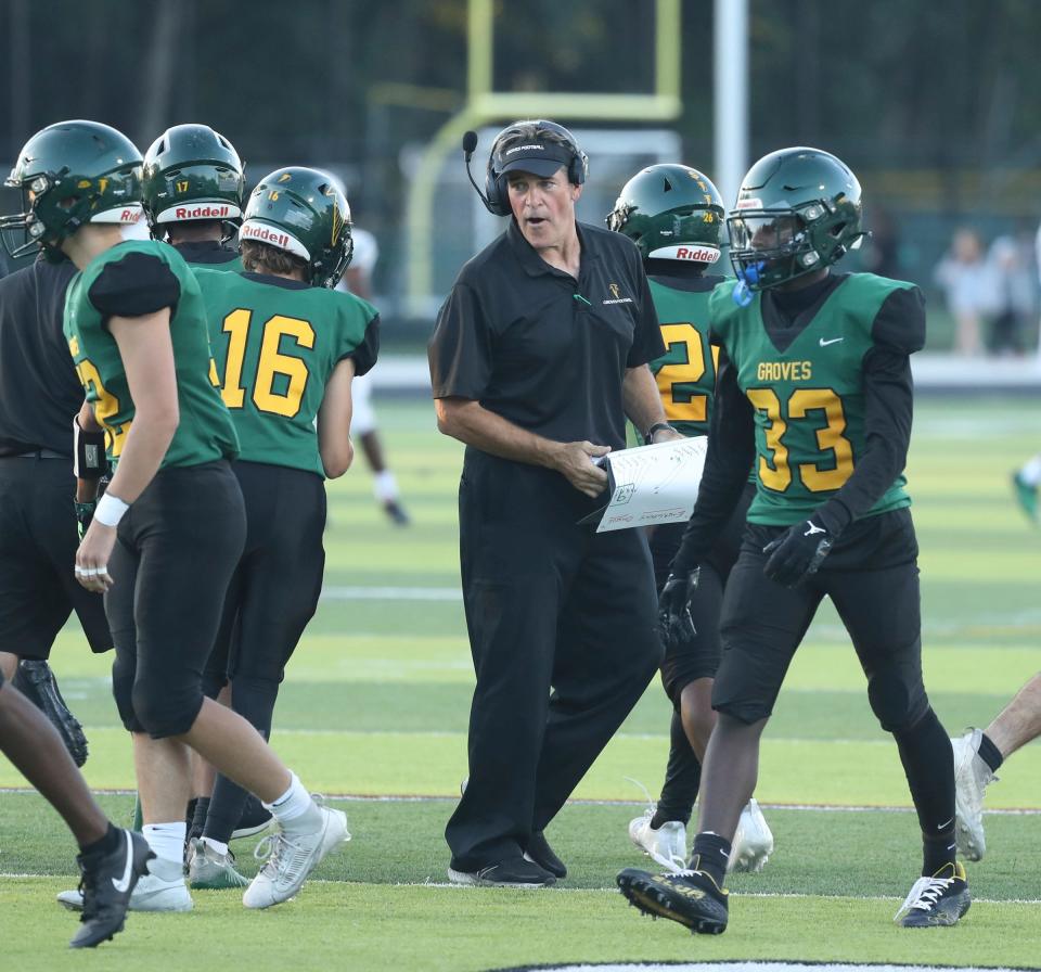 Birmingham Groves head coach Brendan Flaherty on the sidelines against West Bloomfield during first-half action at Birmingham Groves on Thursday, Aug. 31, 2023.