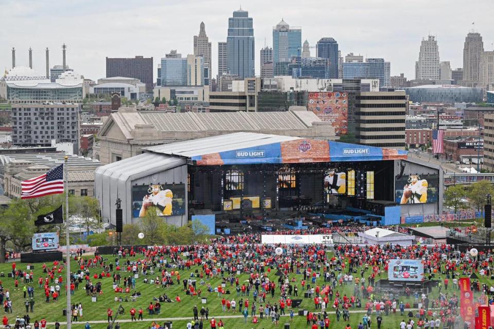 Fans begin to gather in front of the NFL Draft Theater stage to watch the night’s draft selections Thursday, April 27, 2023, in front of Union Station in Kansas City.