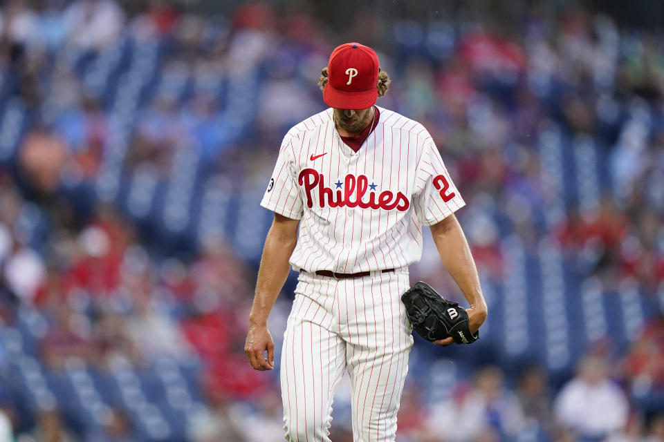 Philadelphia Phillies pitcher Aaron Nola walks to the dugout after pitching during the first inning of an interleague baseball game against the Boston Red Sox, Friday, May 21, 2021, in Philadelphia. (AP Photo/Matt Slocum)