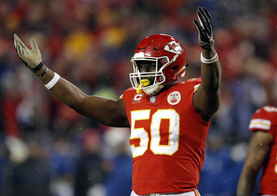 FILE - In this Jan. 12, 2019, file photo, Kansas City Chiefs linebacker Justin Houston (50) celebrates during the second half of an NFL divisional football playoff game against the Indianapolis Colts in Kansas City, Mo. The Indianapolis Colts have signed free agent defensive end Justin Houston. Terms of the deal were not immediately available. (AP Photo/Charlie Neibergall, File)
