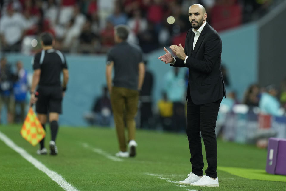 Morocco's head coach Walid Regragui reacts during the World Cup round of 16 soccer match between Morocco and Spain, at the Education City Stadium in Al Rayyan, Qatar, Tuesday, Dec. 6, 2022. (AP Photo/Francisco Seco)