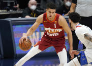 Denver Nuggets forward Michael Porter Jr., left, drives to the rim as New Orleans Pelicans guard Lonzo Ball defends in the first half of an NBA basketball game Wednesday, April 28, 2021, in Denver.(AP Photo/David Zalubowski)