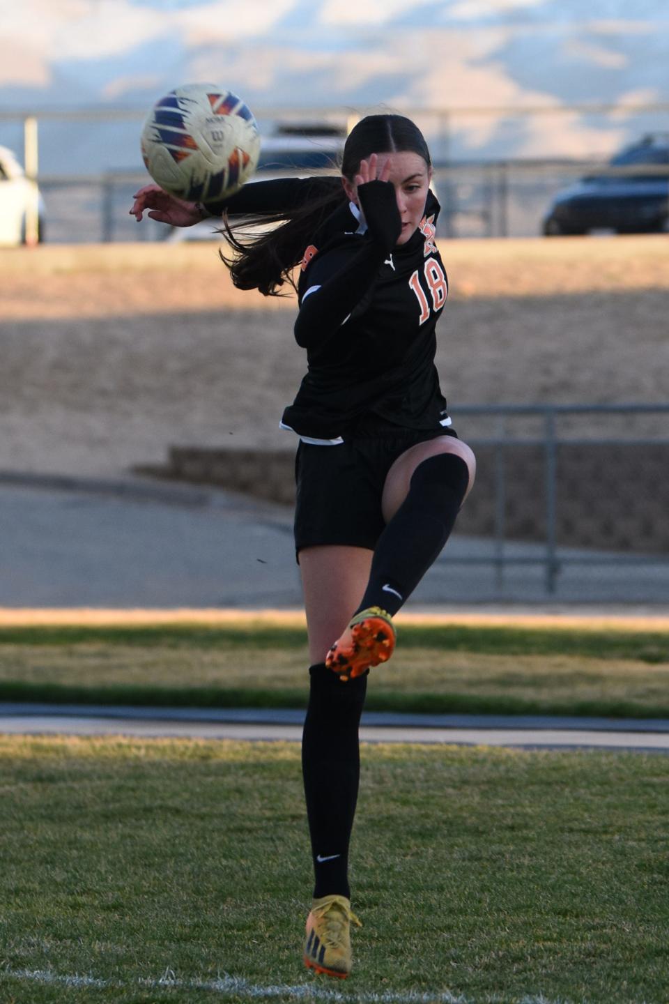 Apple Valley's Jadyn Bechtel kicks the ball during the first half against Canyon on Thursday, Feb. 8, 2024. Apple Valley beat Canyon 5-0 and advanced to the second round of the Division 3 playoffs.