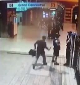 The man approaches the officers at Central Station. Source: The Sunday Telegraph