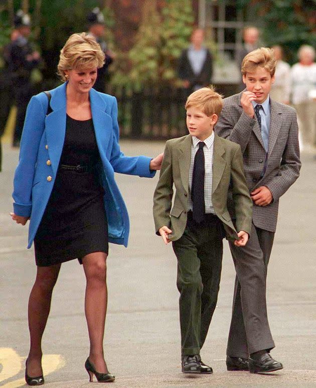 Prince William with Diana, Princess of Wales and Prince Harry on the day he joined Eton in Sept 1995. Photo: Getty