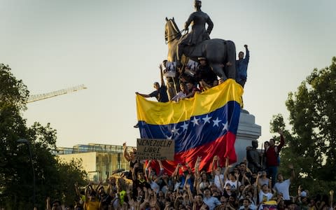 housands of protesters gather at Plaza Baquedano to demonstrate their support for opposition leader Juan Guaido - Credit: Getty&nbsp;/Agencia Makro