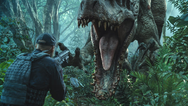 Is <em>Jurassic World</em> better than <em>Jurassic Park</em>? That seems to be the only question people want answered about director <strong>Colin Trevorrow</strong>’s ( <em>Safety Not Guaranteed</em>) reboot of the beloved franchise. Over a decade after the last installment — and 22 years after a T. rex wreacked havoc on the original park — Trevorrow's movie takes us back to Isla Nublar and a now fully functioning dinosaur theme park. To answer the question: It’s better than <em>The Lost World</em> and <em>Jurassic Park 3</em>, hands down, but nothing could top the original. Did you truly think it would? <strong> NEWS: This is what the cast of ‘Jurassic Park’ looks like over 20 years later</strong> Universal Pictures Up top, if you’re someone who thinks that <em>Jurassic Park</em> is too sacred for yet another sequel, you’re using extinct logic. When a property makes billions of box office dollars and is globally adored, studios will want to continue that success. 2013’s retrofitting of <em>JP</em> into 3D (a fad that’s since gone out of style as theaters look toward the fourth dimension) proved that it still has legs. Like bringing dinosaurs back to life using DNA found in blood from mosquitoes that were themselves found in petrified amber, you can only hope for the best. <em>Jurassic World</em> is the first entry worthy of being a <em>Jurassic Park</em> sequel. Smartly, <em>Jurassic World</em> leans heavily into the plot of <em>Jurassic Park</em>. (Whereas, if it leaned into the plot of <em>Lost World</em> — dinosaurs living in the wild on another, previously unheard of island! — or <em>JP3</em> — ??? — it would've caved in on itself.) Universal Pictures There’s a lot that will seem familiar: Odd couple protagonists ( <strong>Sam Neill</strong> and <strong>Laura Dern</strong> before; now, <strong>Chris Pratt</strong> as former-Navy animal whisperer Owen Grady and <strong>Bryce Dallas Howard</strong> as no-nonsense corporate darling Claire Dearing, who don’t start off as a couple, but, if you’ve ever seen a movie in your life, you know how they'll end up), and the children ( <strong>Nick Robinson</strong> and <strong>Ty Simpkins</strong>, both charming in a way kids in movies usually aren’t) who force the adults to put aside their differences for the greater good. There’s also the well-intentioned businessman who wants to spare no expense (John Hammond has relinquished the park to <strong>Irrfan Khan</strong>’s Mr. Masrani), the villain who wants to use dinosaurs for his own gain (Dennis Nedry succeeded by <strong>Vincent D'Onofrio</strong>’s InGen head of security, Vic Hoskins, who wants to militarize raptors), and a scientist who maybe oversteps his bounds ( <strong>BD Wong</strong> reprising his role, the only human character to return to the franchise). <strong> NEWS: Pratt tells ET what he’s sorry for on the ‘Jurassic World’ press tour</strong> Then there’s what’s new. That’s the movie's biggest triumph: The park itself. The grand, sweeping shots of Jurassic World, set to that classic <strong>John Williams</strong> theme, are the first time in three sequels that will make you feel any of the awe and magic you felt the first time. The attractions — including a petting zoo with baby triceratops! — manage to capture the imagination as much as anything <strong>Steven Spielberg</strong> showcased during his tenure. In all honestly, we could have watched just the normal operating procedures at the park for two hours and would have been just as happy. Alas, chaos must ensue at the park, eventually, or we don’t have a movie. Universal Pictures <em> Jurassic World</em> manages to bring itself into the 21st century fairly deftly. It’s self-referencing in the way all blockbusters self-reference in the 2010s, and openly winks at its own product placement — an early gag has Claire boasting about “Verizon Wireless presents Indominus rex” — though it does misstep in this same department with constant Mercedes Benz plugs. No surprise, since Indominus rex stars in her own Mercedes ad. As for concerns over CGI taking the place of animatronics, ultimately they are unwarranted. The movie is beautiful. The dinosaurs are breathtaking. There is so much wow-factor and spectacle to behold in the two hours of impressively staged action set piece after action set piece that you’re never not having fun. It’s a pure joy to watch. Isn’t that what we demand from a <em>Jurassic Park</em> movie? That said, it suffers some of the same pitfalls most modern blockbusters do: There are <em>“human moments”</em> oddly shoehorned within action bits. (A romantic kiss during a pteranodon attack? Seems unlikely.) It can be a bit heavy-handed with morality too, especially since there is no real lesson to be learned except what we already know: Bringing back dinosaurs always ends badly. Universal Pictures There is also a problem inherent to <em>Jurassic </em>movies: That human characters, by rule, are less interesting than dinosaurs. Pratt — who abandons the goofy charm of Star-Lord and instead plays a straightforward action hero in the vein of, ahem, <em>Indiana Jones</em> — is not the star of the movie. Nor is Howard, who is great. The dinosaurs are the star. The movie gives more somberness to the death of one sauropod than to all of the humans chomped up and spit out by various dinos, combined. <strong> WATCH: Here's a day in the life of Chris Pratt on the <em>Jurassic World</em> set</strong> The exception is scene-stealing performances by <strong>Jake Johnson</strong> ( <em>New Girl</em>) and <strong>Lauren Lapkus</strong> ( <em>Orange Is the New Black</em>), as control room flunkies Lowery and Vivian. Johnson has gotten plenty of hat tips already, but his performance hinges on Lapkus’, who is equally fun to watch. One of their scenes in particular, a send-up of the hero getting the girl, got by far the biggest laugh of the movie. Runner up: During that aforementioned pterardon attack, a man is shown desperately fleeing with two margaritas in his hands. The Indominus rex isn't necessarily the star either. The Tyrannosaurus (the same T. rex from Spielberg’s <em>Jurassic Park</em>!) and the raptors, clever as ever, provide plenty of entertainment, but the heavy weight champ of the movie is the mosasaur. The mosasaur — the giant, underwater reptile who eats a great white shark in the trailer — executes one of the most brutal kills of the entire franchise, and every time she appeared onscreen, the audience shrieked with pleasure. Maybe she’s a metaphor for the movie: Completely bonkers, but there to please. <strong> NEWS: Jessica Chastain wants you to know se is not in ‘Jurassic World’</strong> Universal Pictures It’s not surprising then that like <em>Jurassic Park</em> before it, <em>Jurassic World</em> leaves us wondering: Where do we go from here? <em>JW</em> stands on its own and would work as a fulfilling one-off, but Trevorrow made sure to plant seeds that could carry over into a sequel. Unless we wait two more decades though, there's going to be the dino-sized task of justifying opening another park in the wake of how much death and destruction there is in this movie. It just would never happen. That is exactly the problem <em>The Lost World</em> and <em> Jurassic Park 3</em> faced. We hope whatever sequel comes next — <em>Jurassic Universe</em>? — fairs better. If not, at least we’ll get more dinosaurs. And more dinosaurs is always good. Now, check out Pratt singing "Margaritaville" at the <em>Jurassic World</em> premiere and Bryce Dallas Howard playing ET's game of "Bryce or Jessica?"