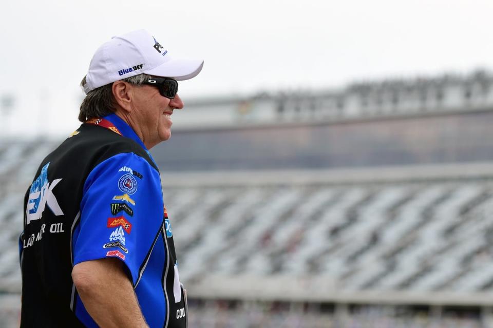 John Force, pictured, crashed into a concrete wall at 302mph while competing in the NHRA Virginia Nationals on Sunday. He is now in the intensive care unit as doctors assess his injuries. (Getty Images)