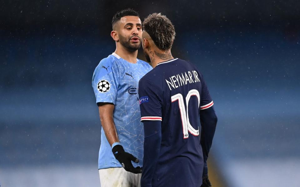 Riyad Mahrez of Manchester City clashes with Neymar of Paris Saint-Germain during the UEFA Champions League Semi Final Second Leg match between Manchester City and Paris Saint-Germain at Etihad Stadium on May 04, 2021 in Manchester, England. - GETTY IMAGES