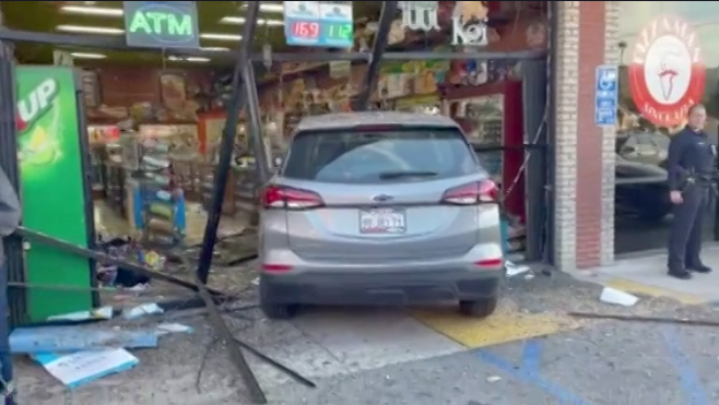 Driver plows into neighborhood smoke shop