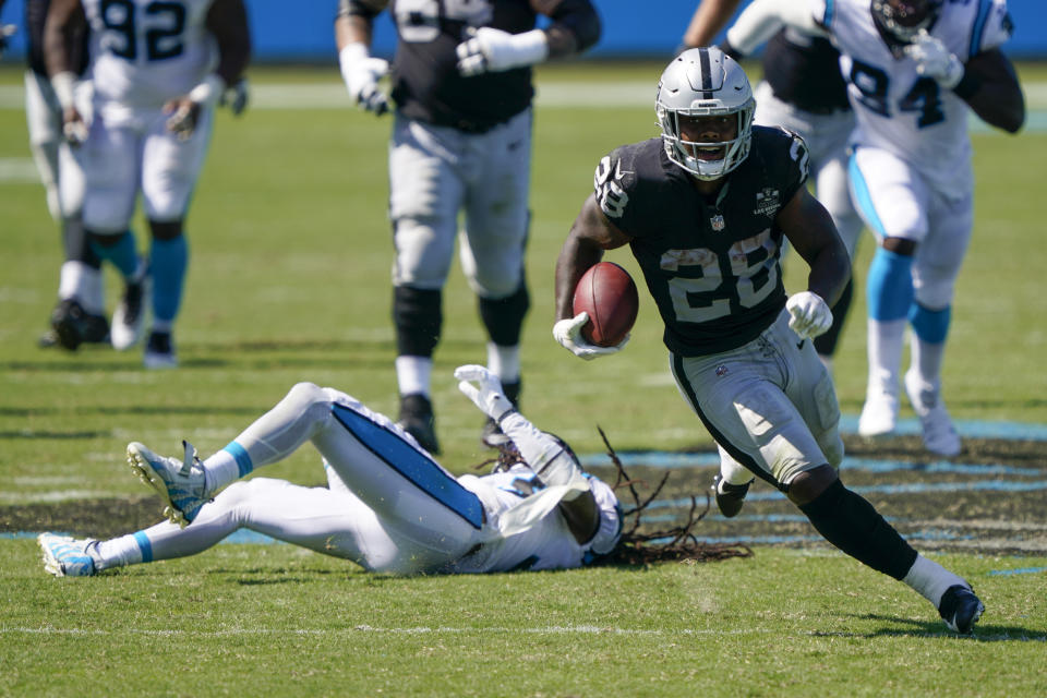 Las Vegas Raiders running back Josh Jacobs runs against the Carolina Panthers during the second half of an NFL football game Sunday, Sept. 13, 2020, in Charlotte, N.C. (AP Photo/Brian Blanco)