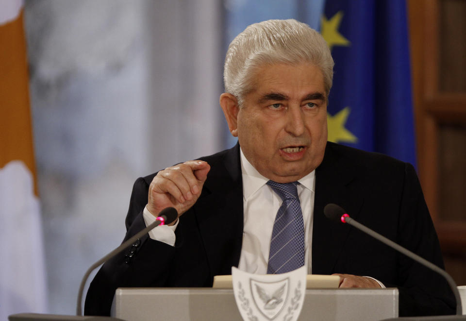 Cypriot President Dimitris Christofias makes his statement to the media at the presidential palace in Nicosia, Cyprus, Friday, June 1, 2012. The president says he has tasked officials to draw up plans on how the country would deal with Greece's possible exit from the eurozone. Christofias told a news conference that conditions would be "chaotic" if debt-drowned Greece quits the euro and that the impact of such a move would be felt not only by all other countries using the currency, but all of Europe. (AP Photo/Petros Karadjias)