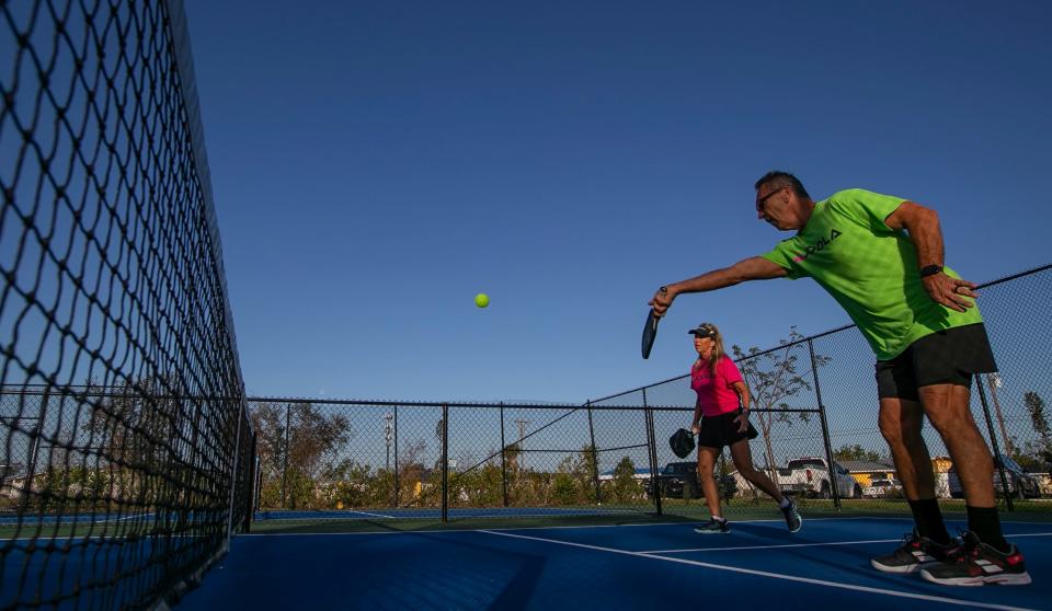 Charlie and Trixie Mangold play a round of pickleball at Giuffrida Park in Cape Coral.