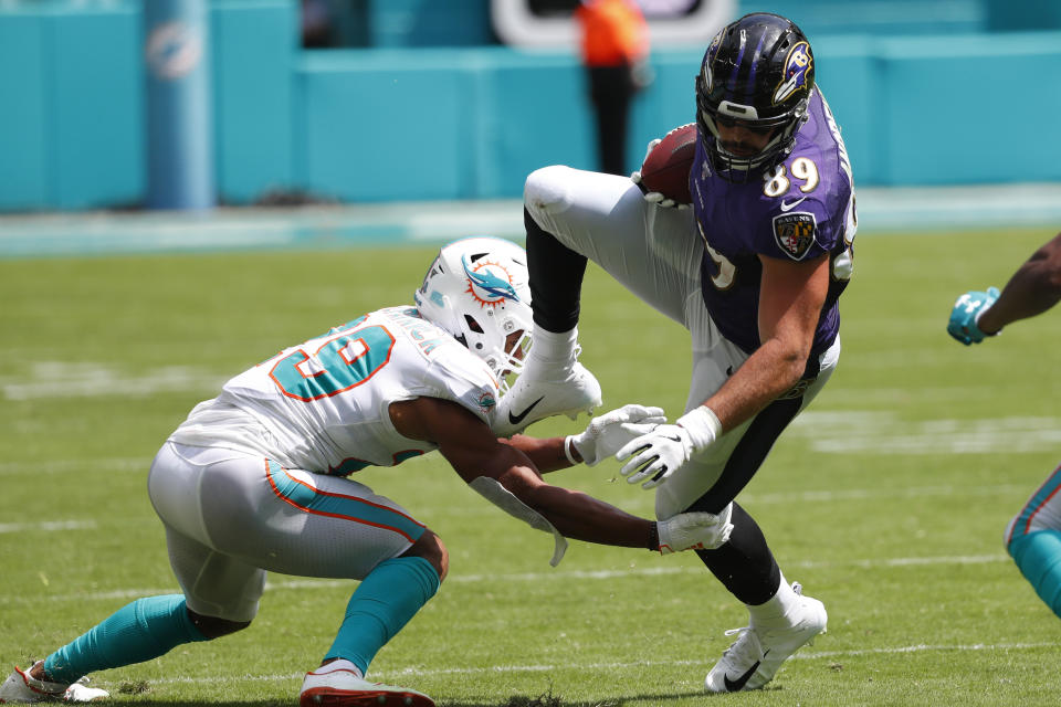 Miami Dolphins free safety Minkah Fitzpatrick (29) tackles Baltimore Ravens tight end Mark Andrews (89), during the first half at an NFL football game, Sunday, Sept. 8, 2019, in Miami Gardens, Fla. (AP Photo/Wilfredo Lee)