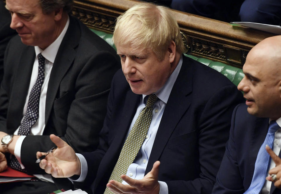 In this handout photo provided by the House of Commons, Britain's Prime Minister Boris Johnson gestures during the first Prime Minister's Questions of the year, in the House of Commons in London, Wednesday, Jan. 8, 2020. The president of the European Commission warned Britain on Wednesday that it won’t get the “highest quality access” to the European Union's market after Brexit unless it makes major concessions. (Jessica Taylor/House of Commons via AP)