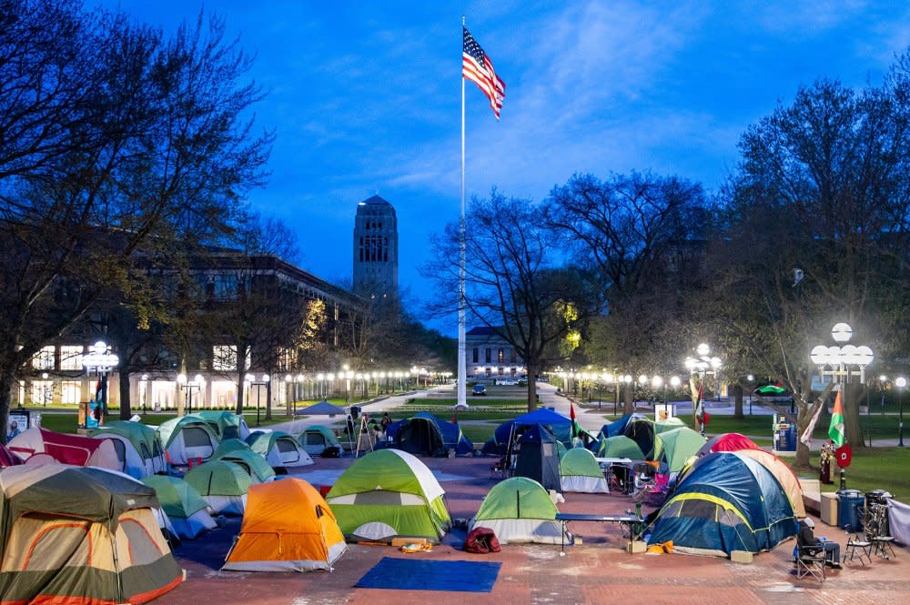 A deep blue sky over several tents set up over the University of Michigan's Central Campus early in the morning on April 23.<span class="copyright">Josh Sinha for The Michigan Daily</span>